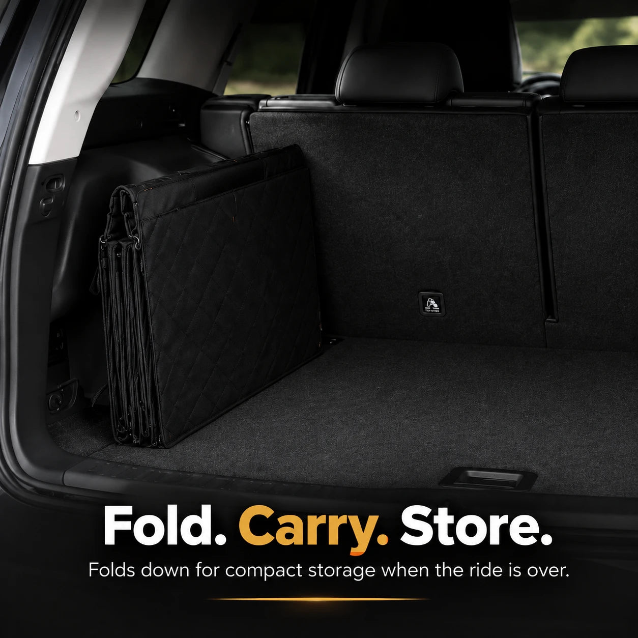 SeatSpan folded flat for storage beside an open trunk